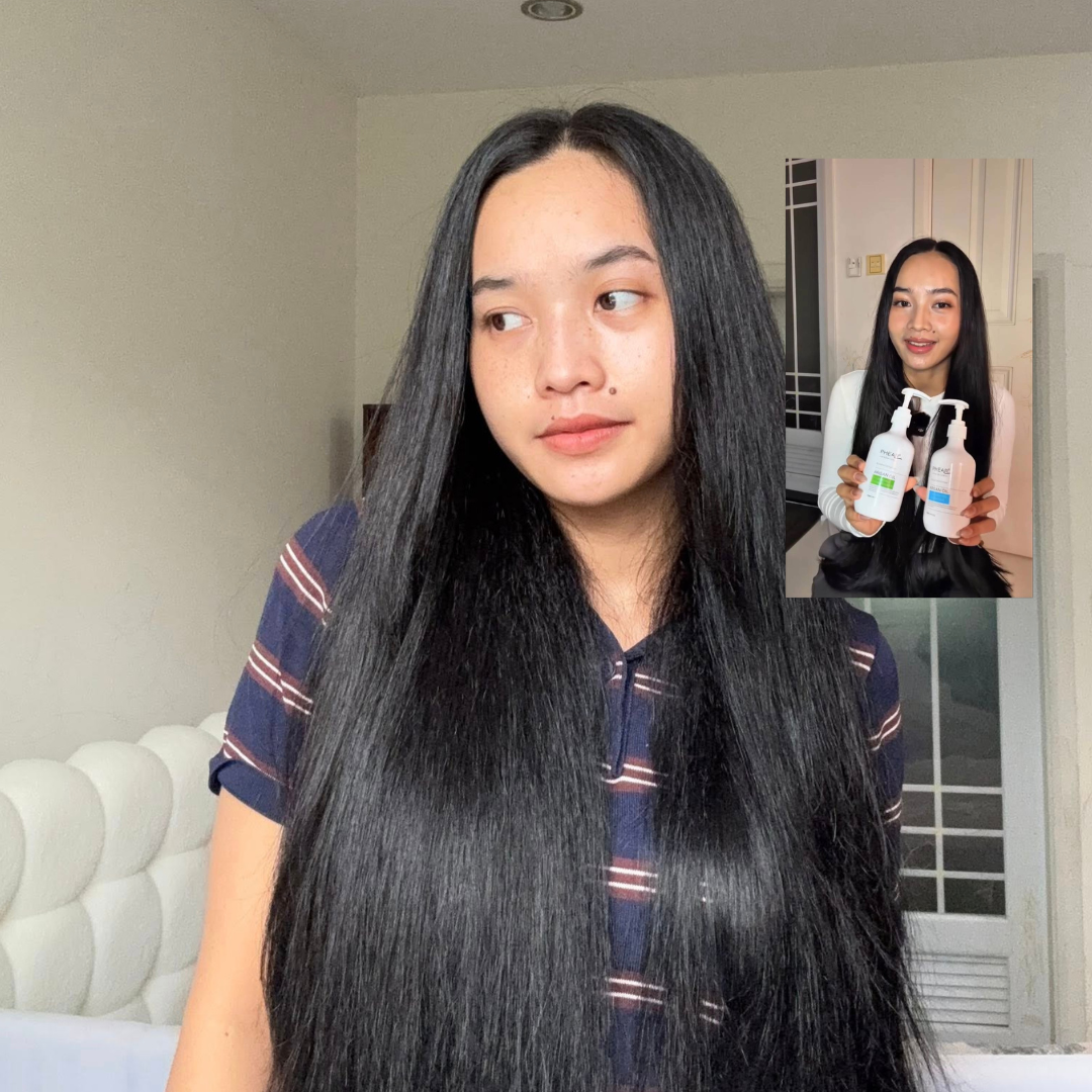 Woman with long black hair in a room with a couch and window.